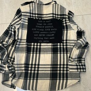 Sojara white and cream flannel with a patch in the back